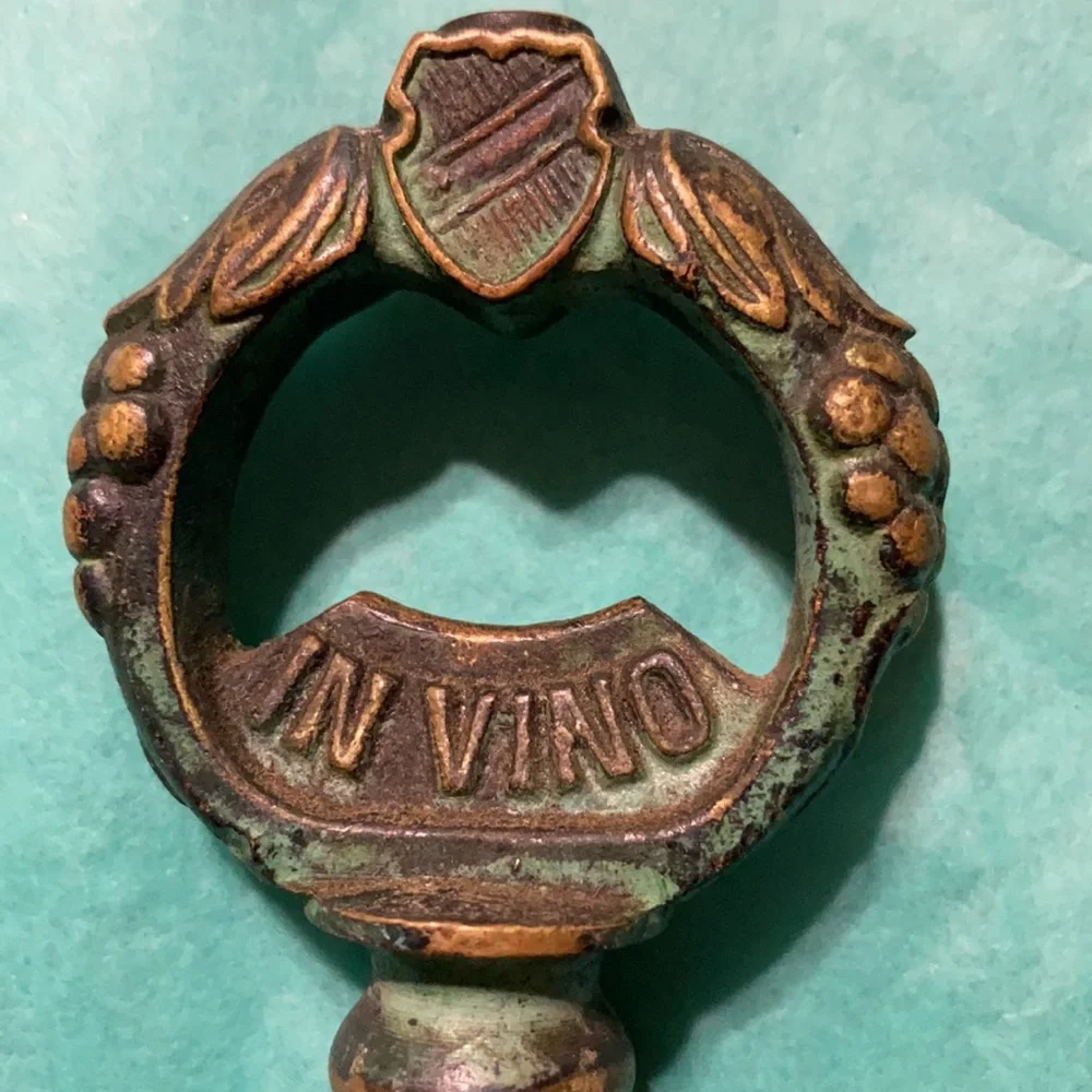 Cool wine cork opener, heavy metal pieces (2)